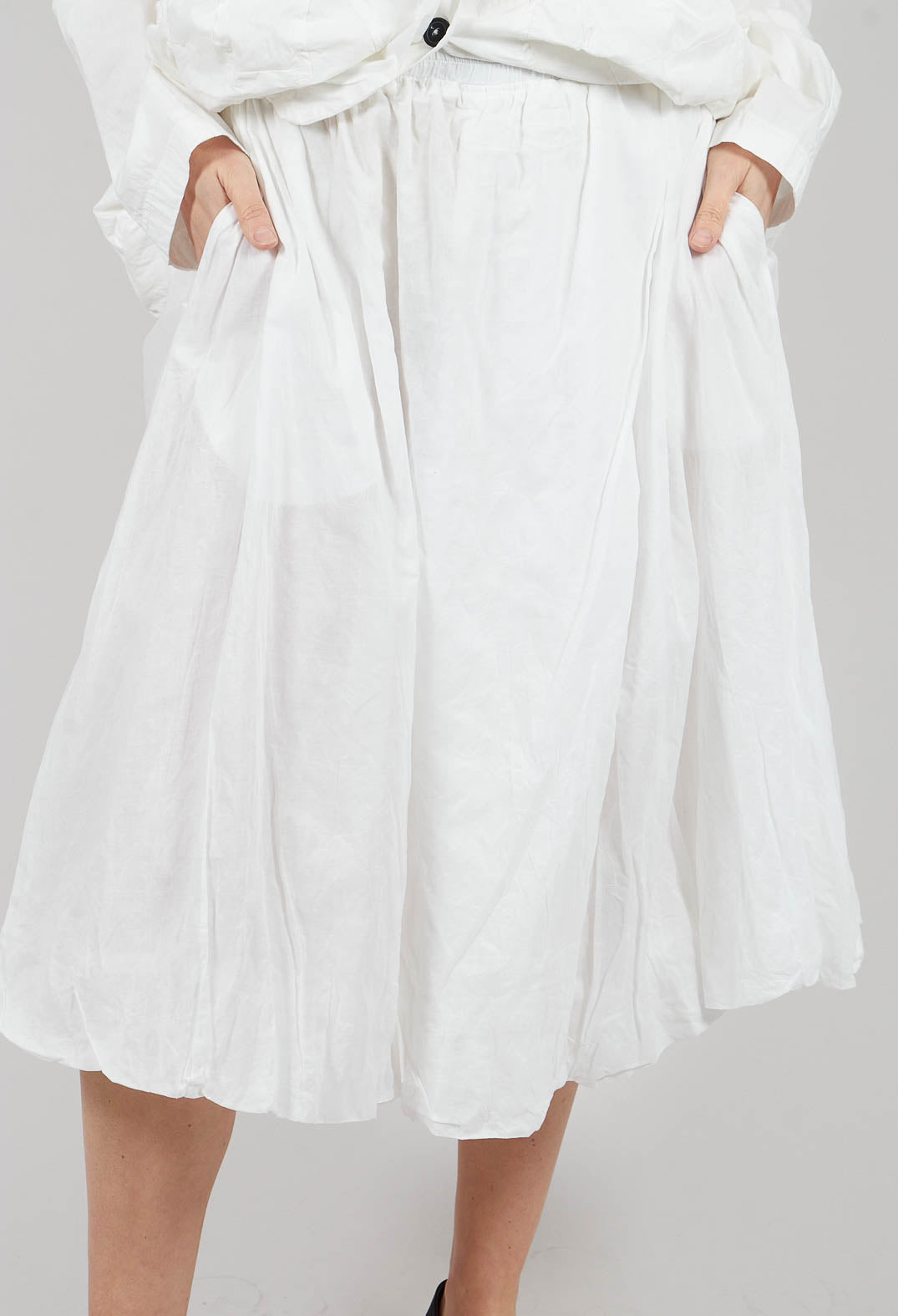 Bubble Hem Skirt with Pleat Detail in Off White