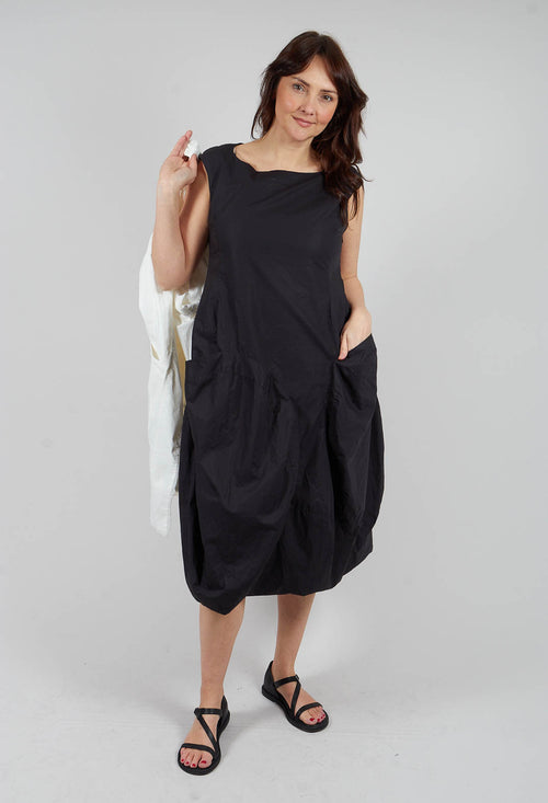 Tulip Hem Dress with Large Pockets in Black