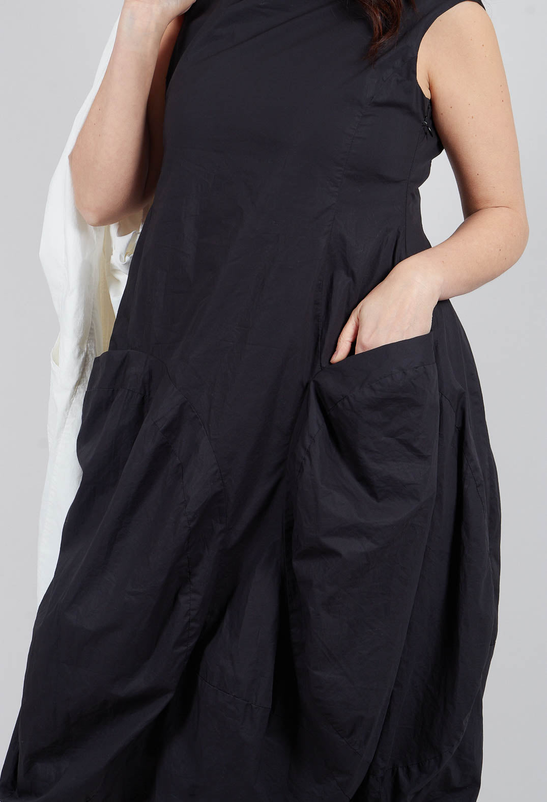 Tulip Hem Dress with Large Pockets in Black