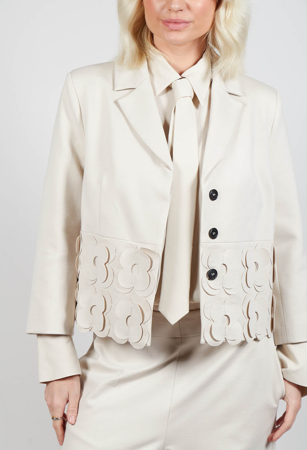 Cropped Jacket with Floral Embellishment in Sandshell