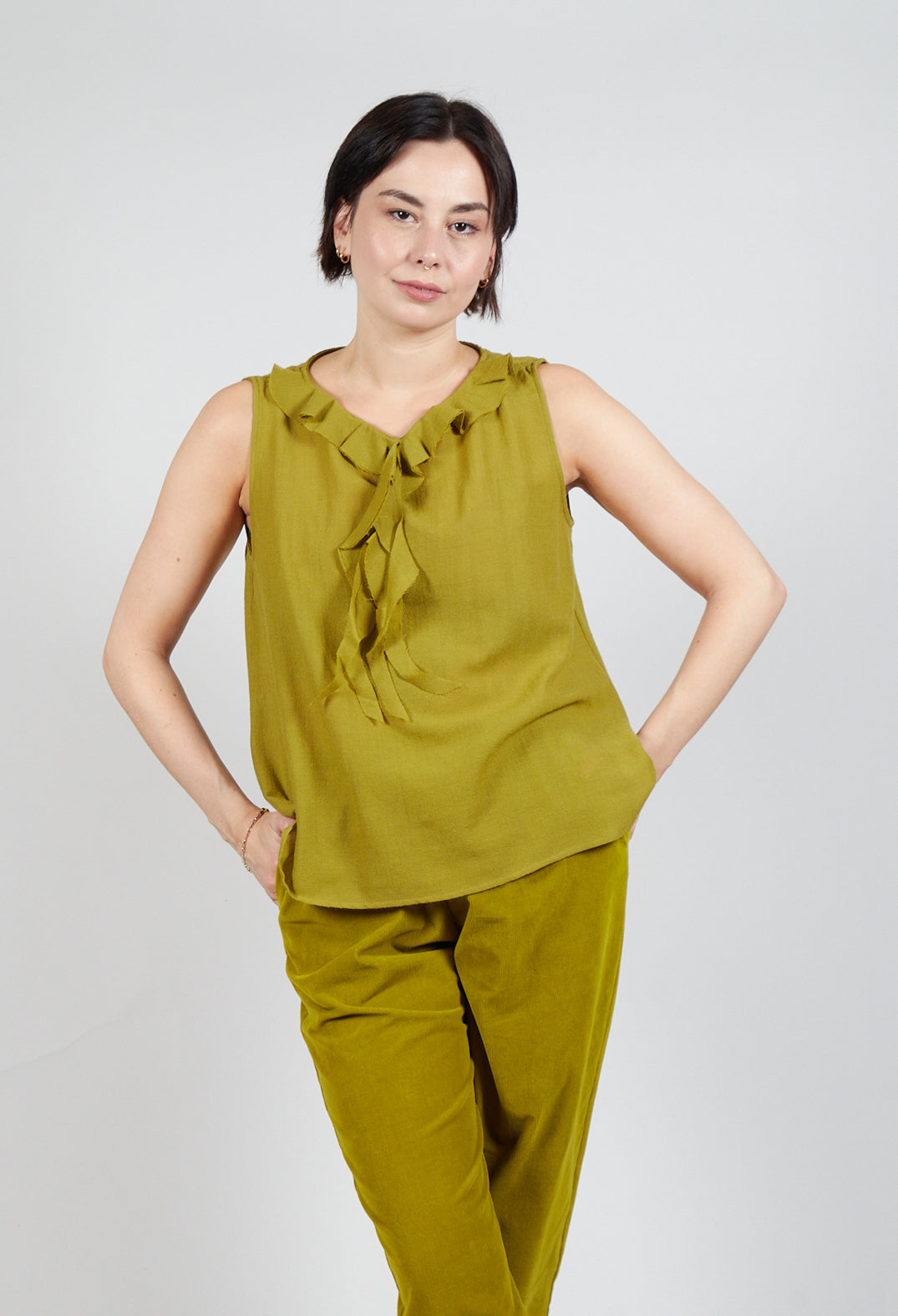 Peplum Vest in Grass Green