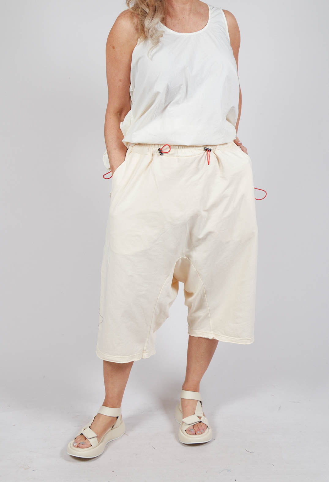 Cropped Drop-Crotch Trousers in Greige