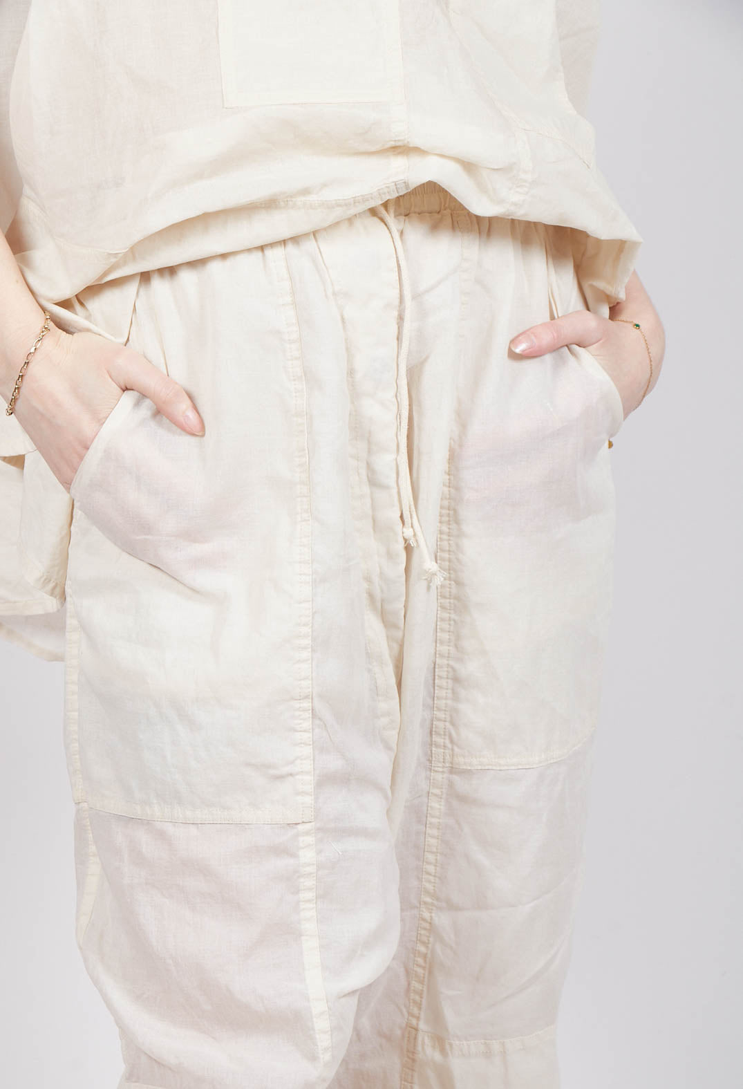 Cropped Sheer Crinkled Trousers in Greige Paper