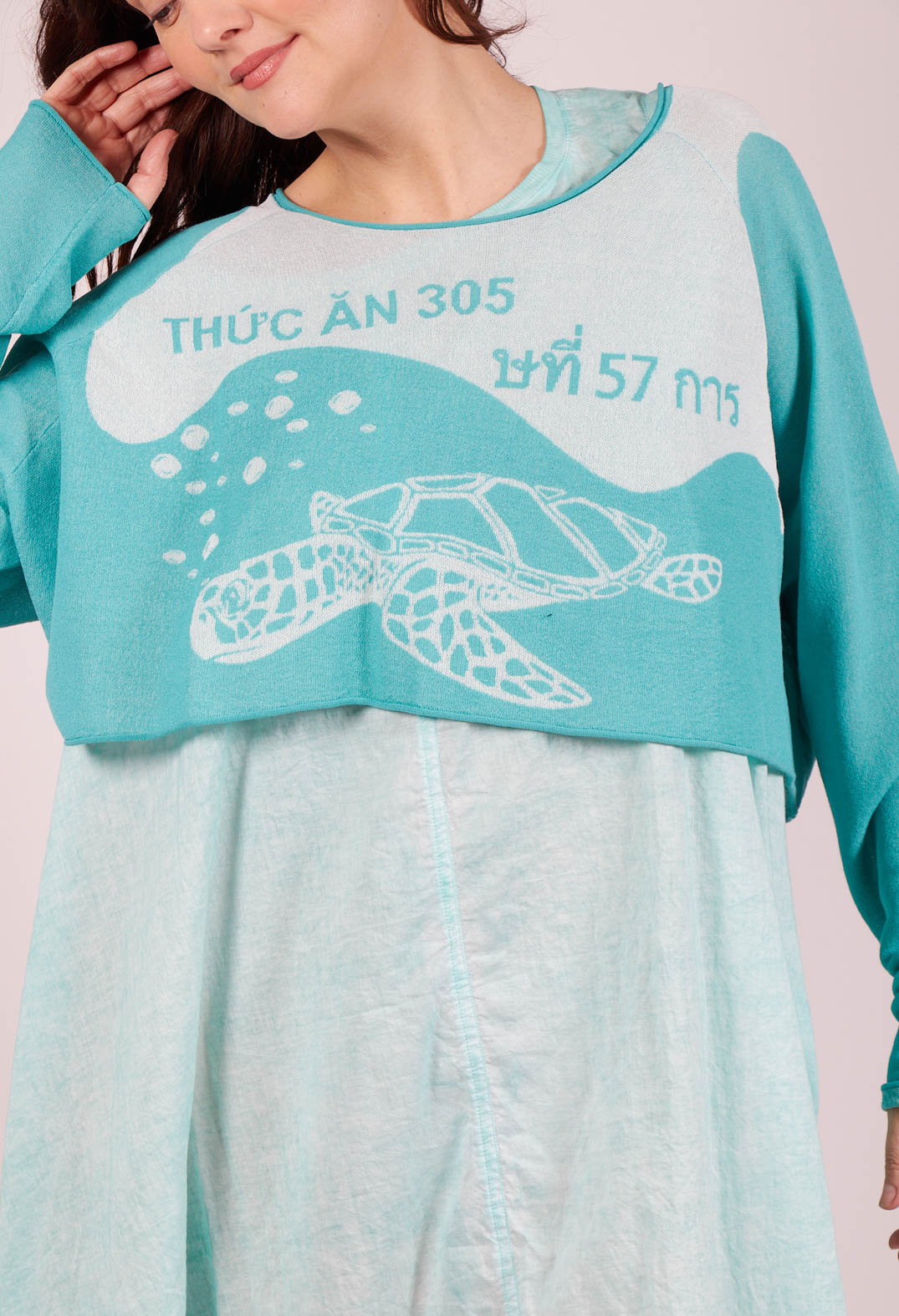 Cropped Pullover with High Low Hem in Aqua Jacquard