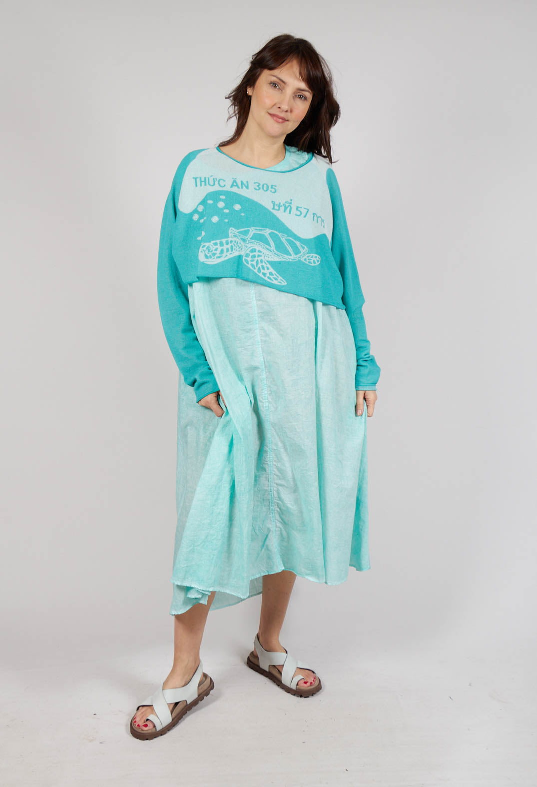 Cropped Pullover with High Low Hem in Aqua Jacquard