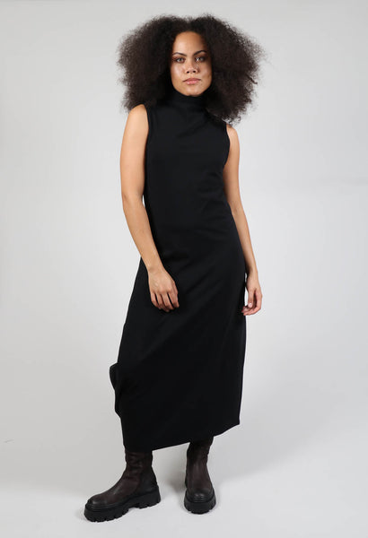 Black knee-length dress with sash by Sarah Pacini