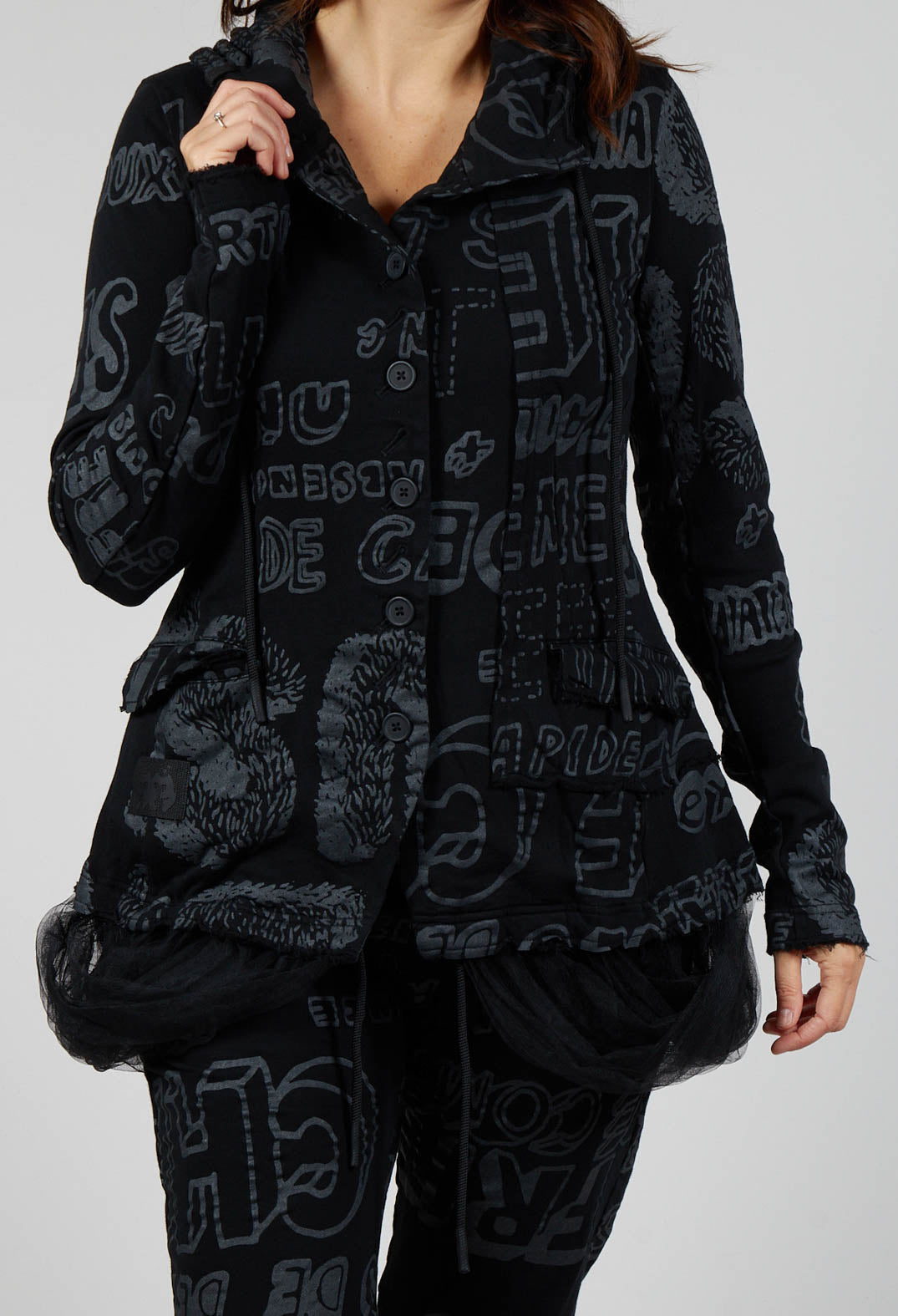 Jersey Jacket with Netted Hemline in Black Shiny Print