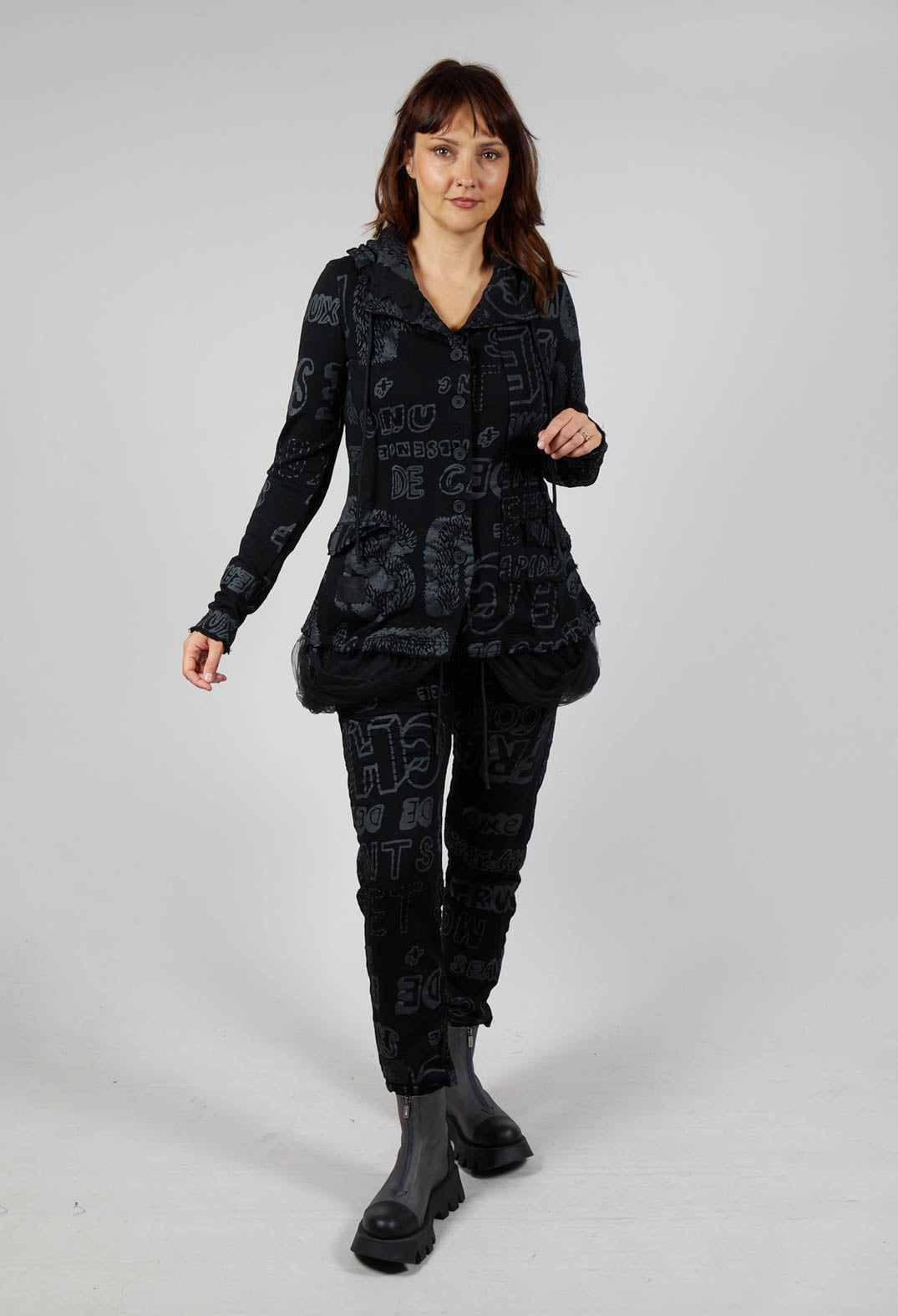 Jersey Jacket with Netted Hemline in Black Shiny Print