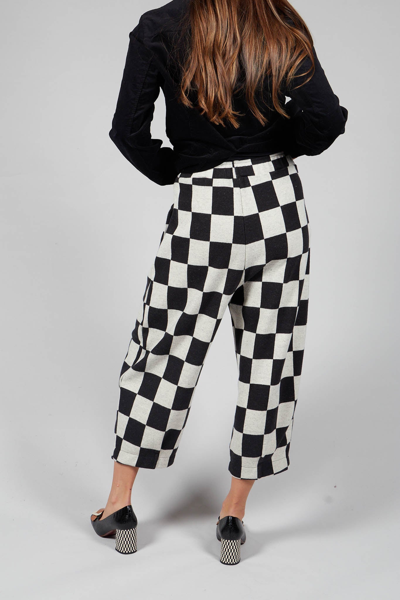 White and black check on sale trousers