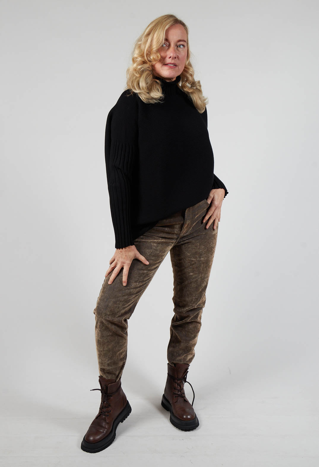 lady wearing trousers in shade nutmeg with chunky brown boots