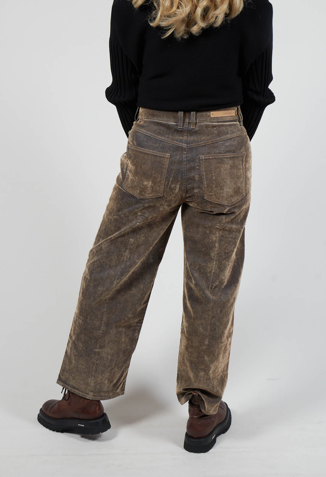 behind shot of ladies brown olek trousers with back pockets and belt loops