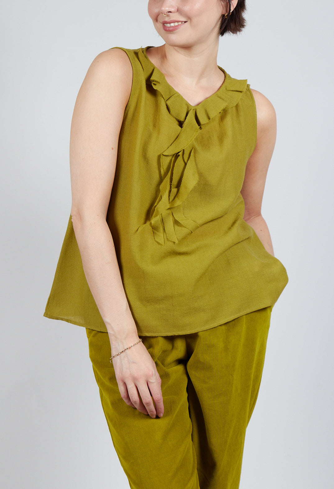 Peplum Vest in Grass Green