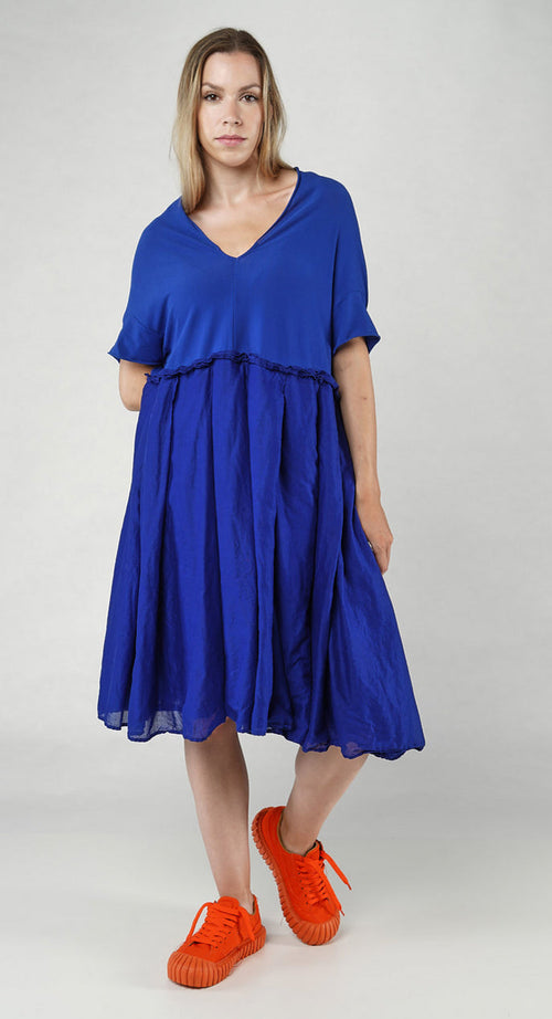 PRE-ORDER - Pleated Midi Dress with Lettuce Hem Detail in Greige (Pictured in Royal)