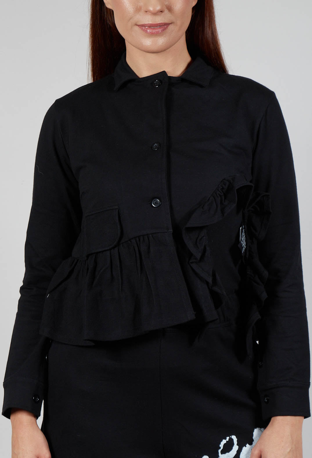 Waved Hem Peplum Jacket in Black