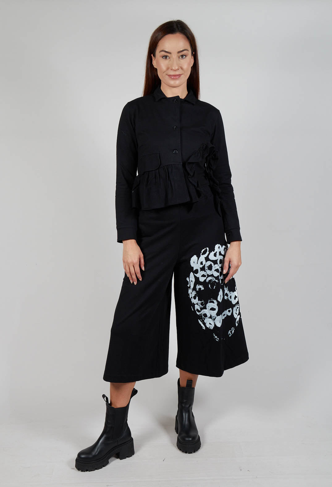 Waved Hem Peplum Jacket in Black