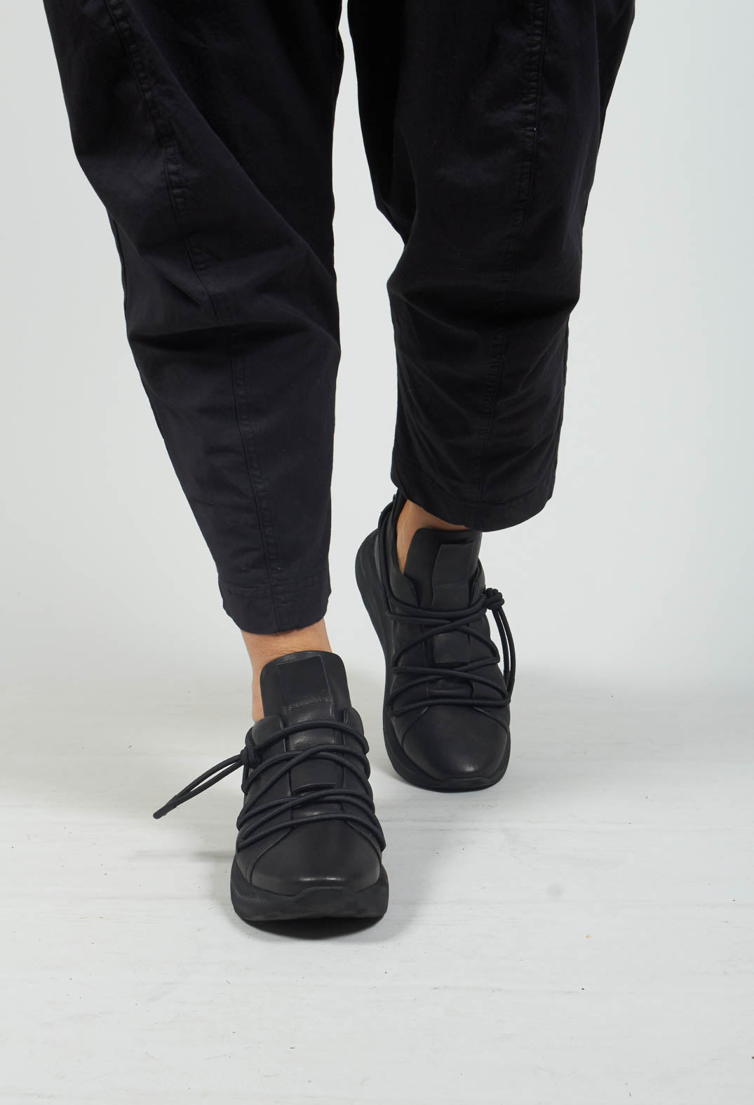 Black elasticated hot sale trainers